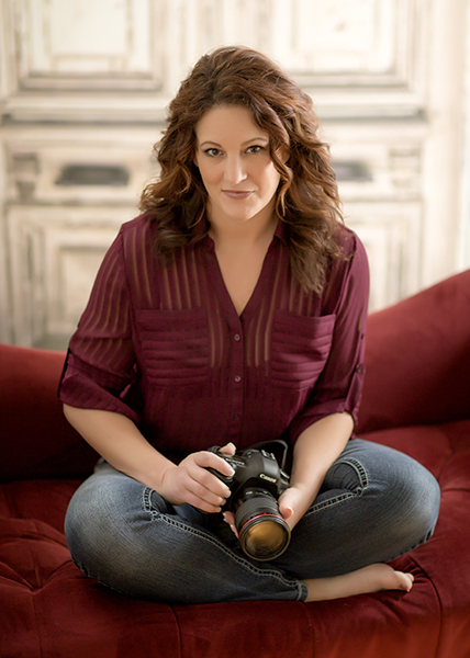 Stefanie Lynn Sitting on a couch with her camera