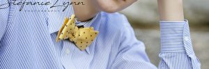 HS Senior portrait, boy wearing button down shirt and bow tie